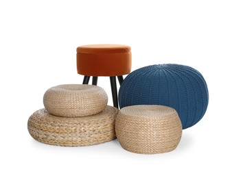 Photo of Different poufs on white background. Home design