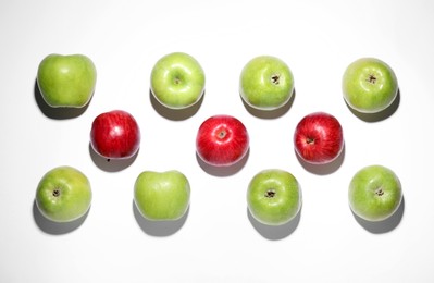 Photo of Ripe green and red apples on white background, flat lay
