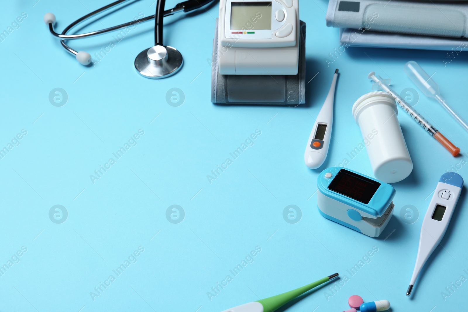 Photo of Different medical objects on color background. Space for text