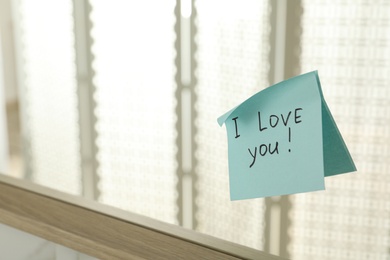 Photo of Sticky note with phrase I love you! on mirror, space for text