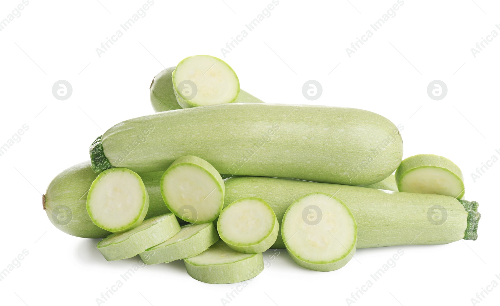 Photo of Fresh ripe green zucchinis isolated on white