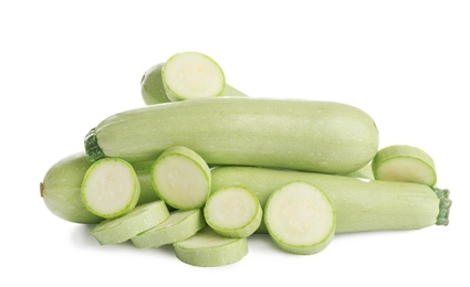 Photo of Fresh ripe green zucchinis isolated on white