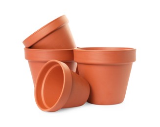 Photo of Empty clay flower pots isolated on white