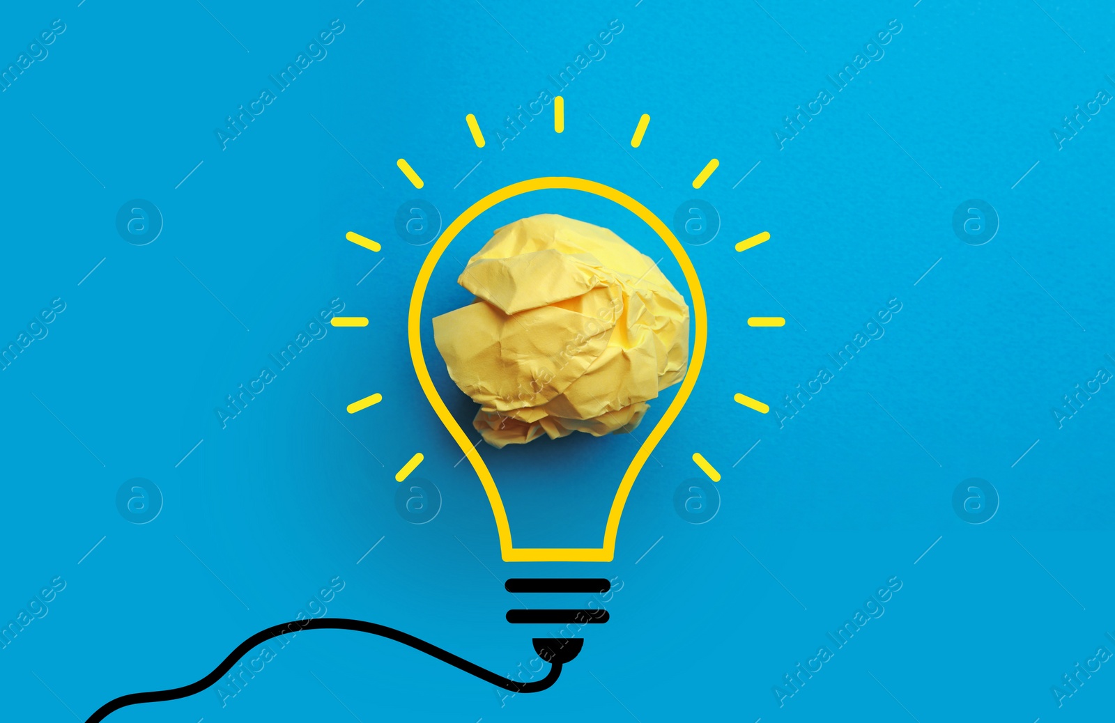 Image of Idea. Illustration of light bulb around crumpled paper ball on light blue background, top view