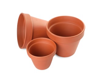 Empty clay flower pots isolated on white