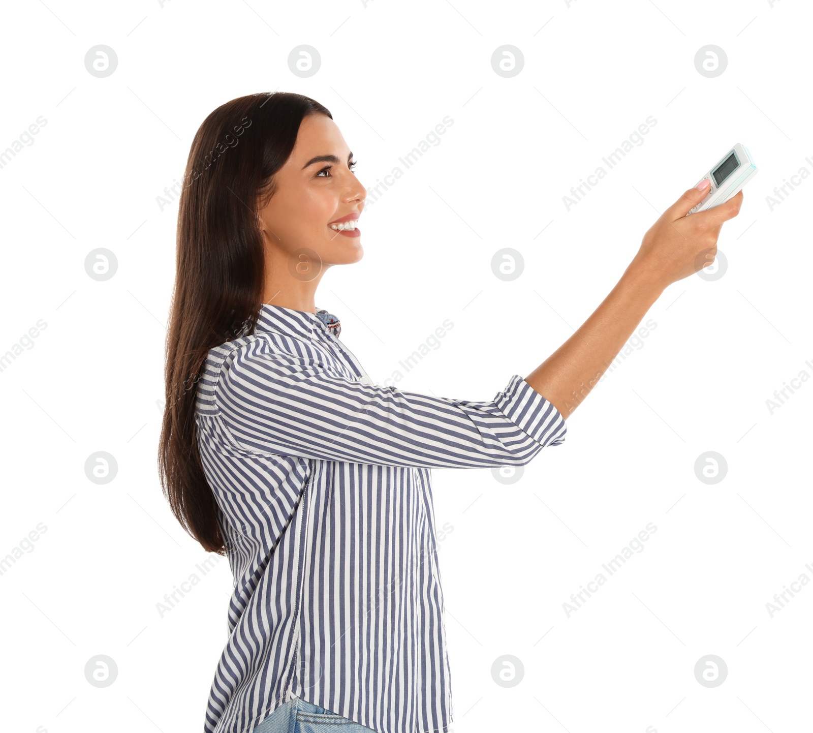 Photo of Young woman turning on air conditioner against white background