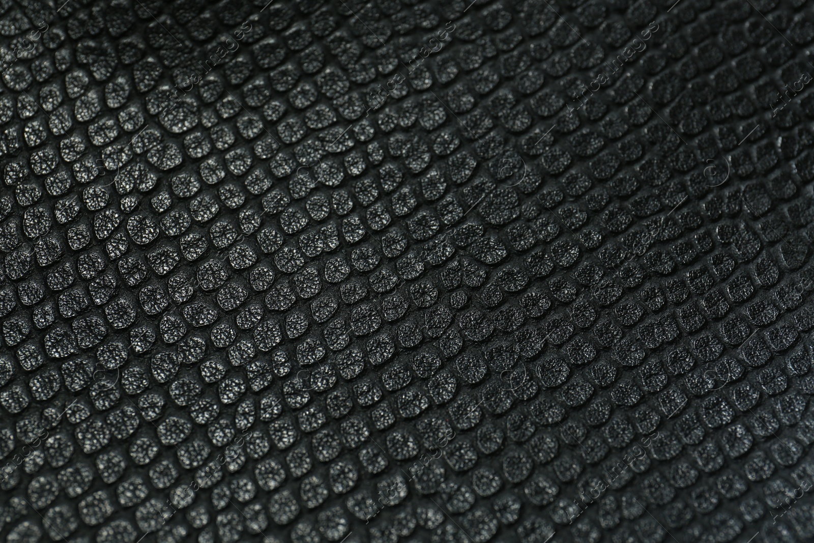 Photo of Black natural leather as background, above view