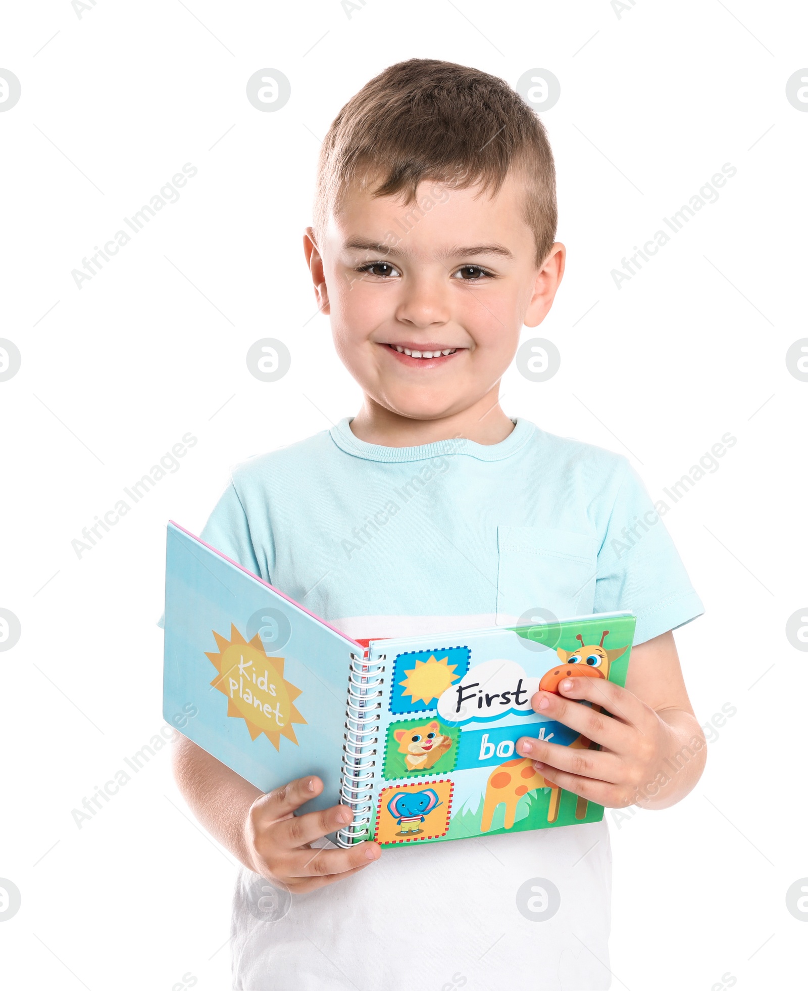 Photo of Cute little boy reading book on white background