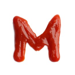 Photo of Letter M written with ketchup on white background