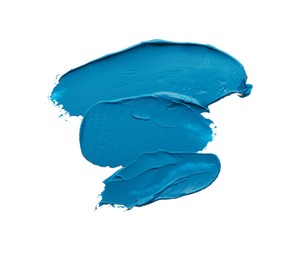 Photo of Blue oil paint strokes on white background, top view