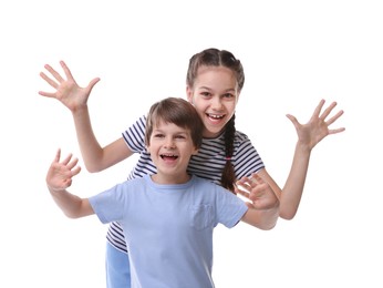 Happy brother and sister on white background