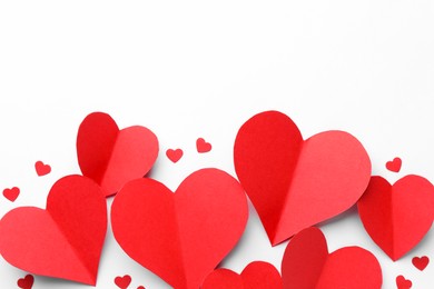 Photo of Paper hearts on white background, flat lay. Space for text