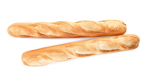 Photo of Tasty baguettes on white background, top view. Fresh bread