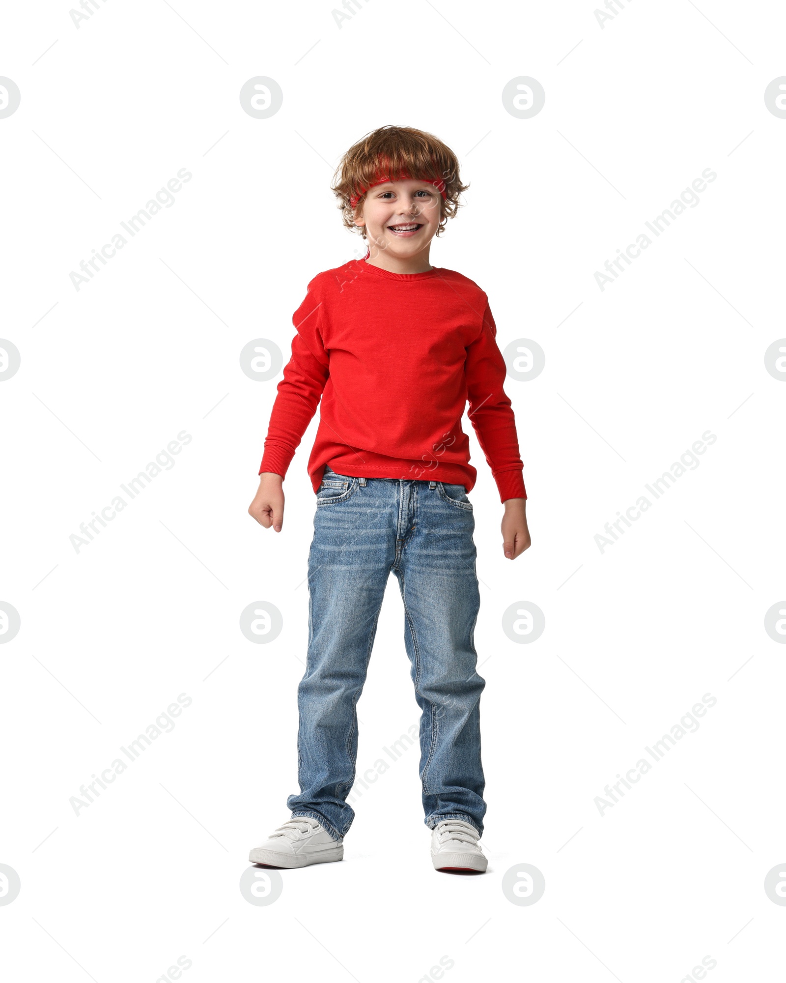 Photo of Happy little boy dancing on white background