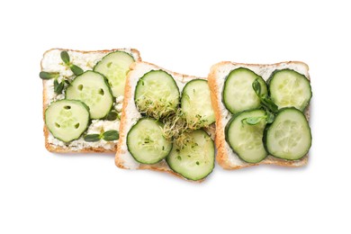 Tasty toasts with cucumber, cream cheese and microgreens isolated on white, top view