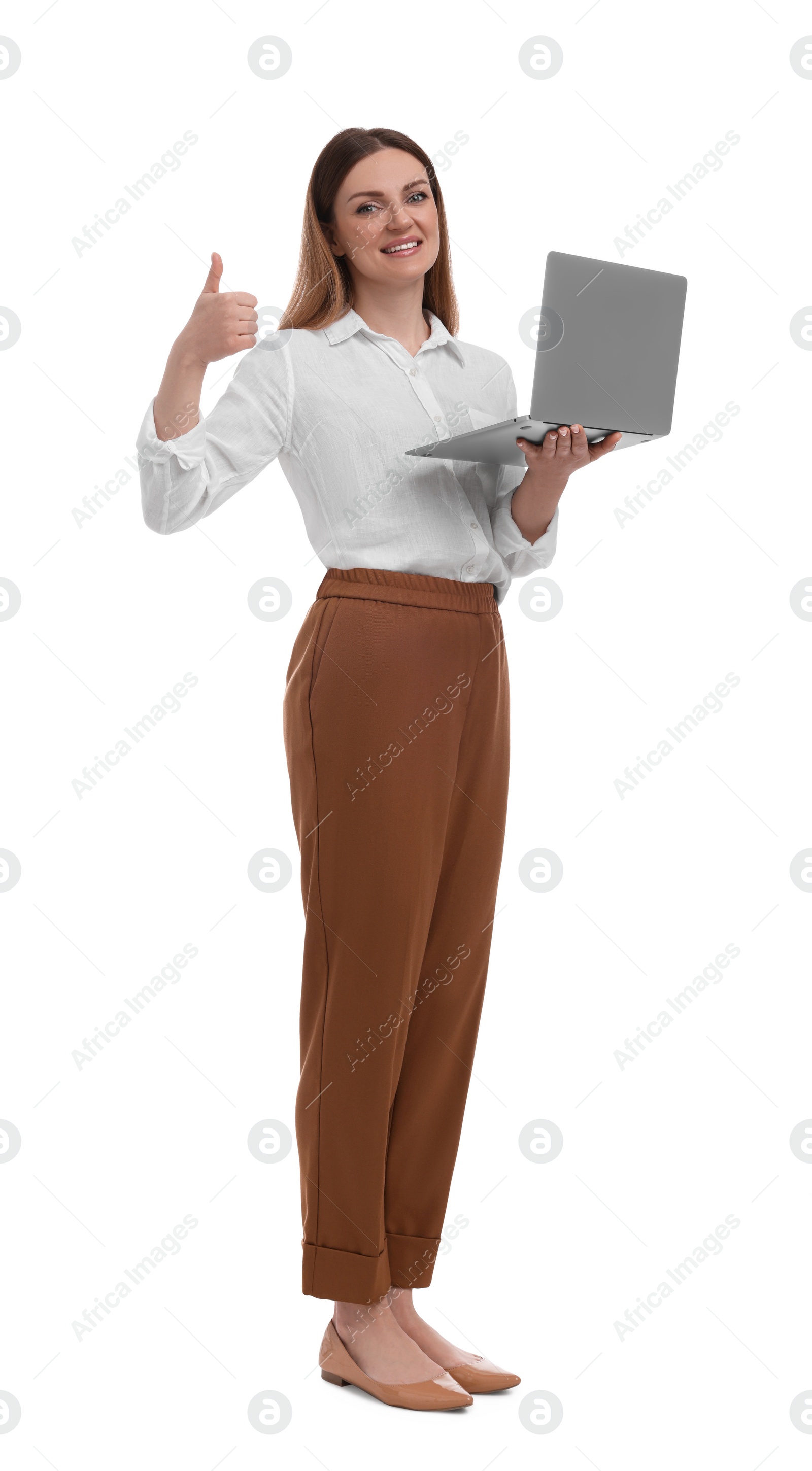 Photo of Beautiful businesswoman with laptop showing thumbs up on white background