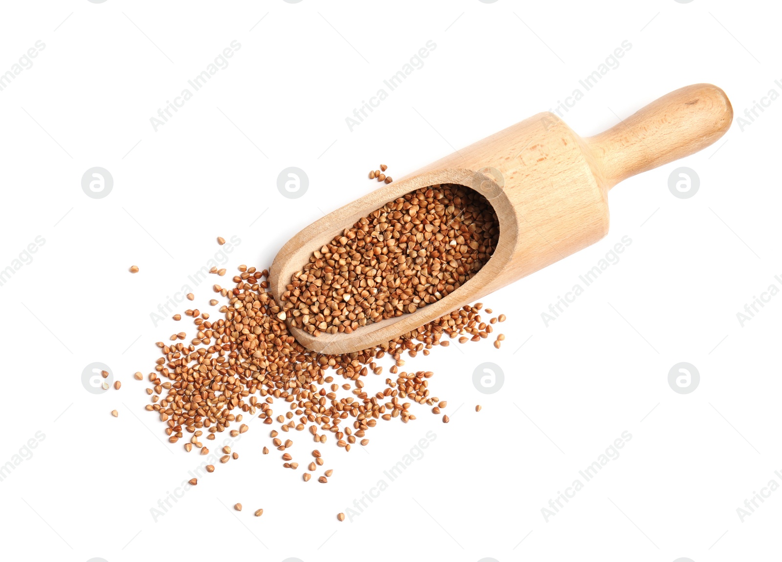 Photo of Scoop with uncooked buckwheat on white background, top view