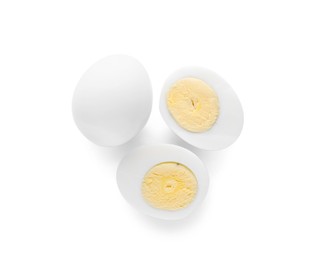 Photo of Fresh peeled hard boiled eggs on white background, top view