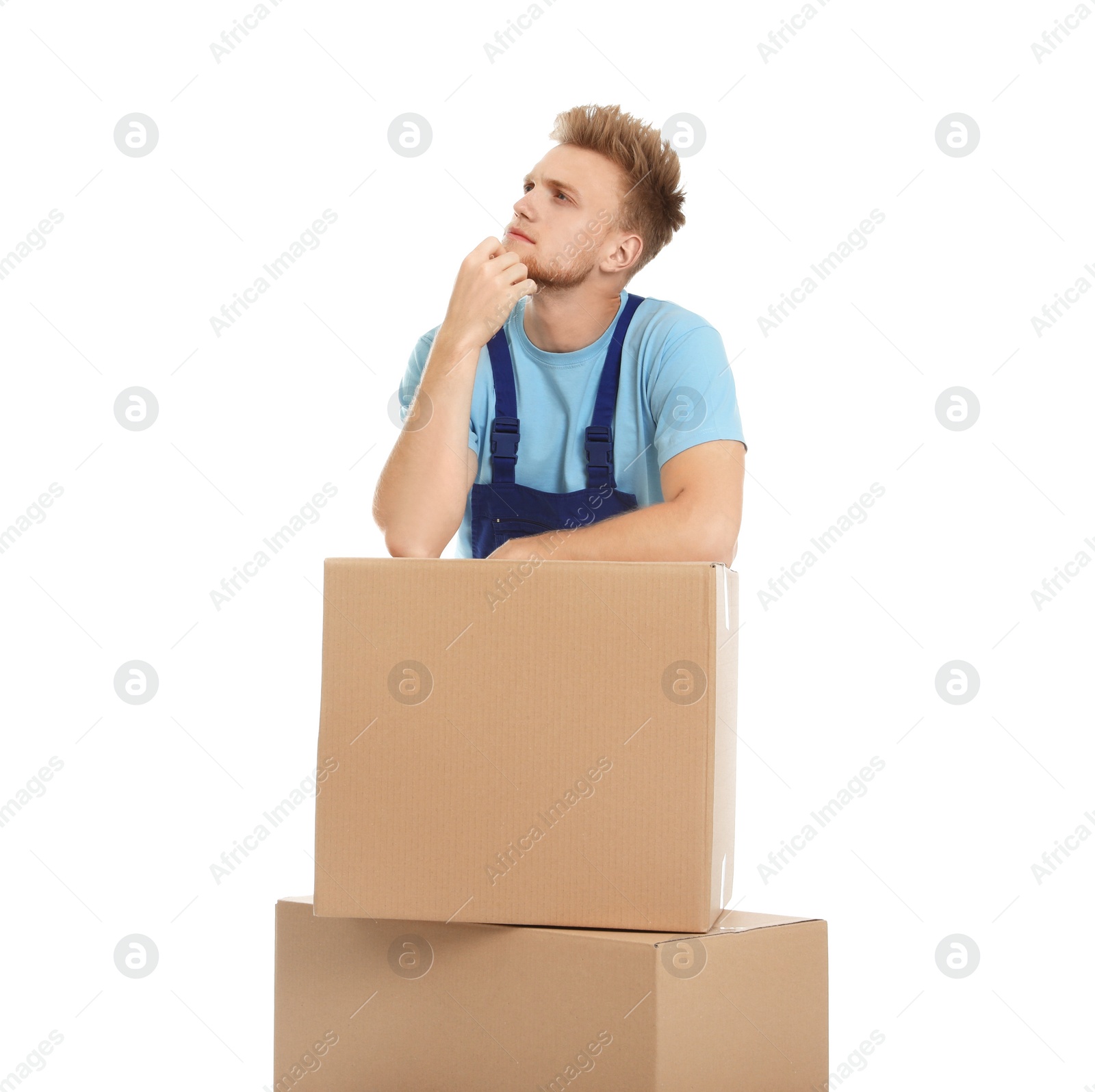 Photo of Portrait of moving service employee with cardboard boxes on white background