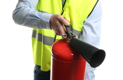 Worker using fire extinguisher on white background, closeup