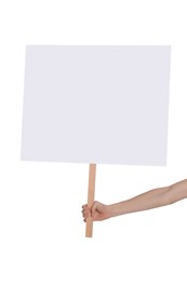 Photo of Woman holding blank sign on white background, closeup