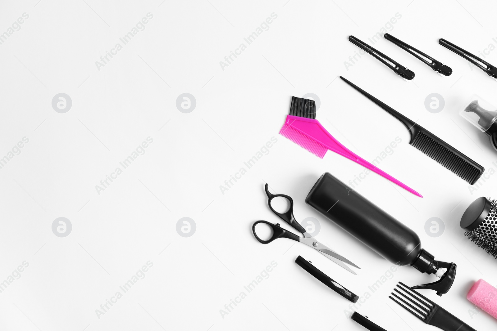 Photo of Professional hairdresser tools on white background