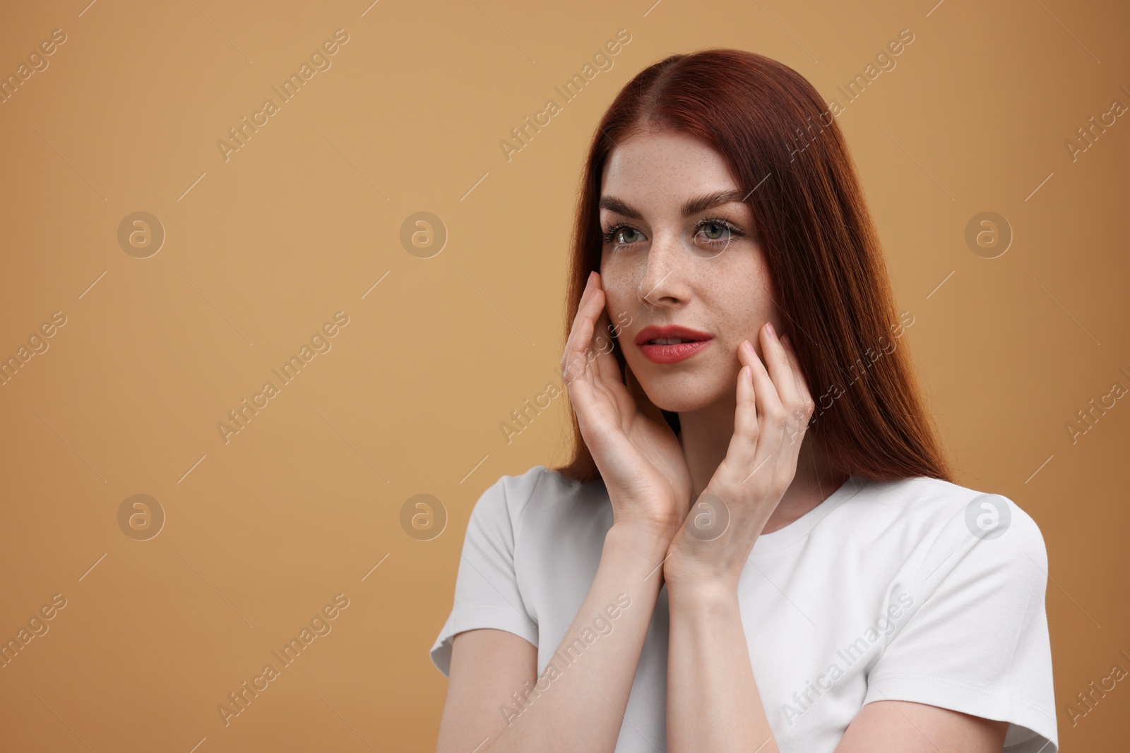 Photo of Portrait of beautiful woman on beige background. Space for text