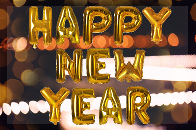 Image of Festive balloons on blurred background, bokeh effect. Happy New Year