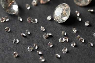 Photo of Beautiful gemstones for jewelry on grey background