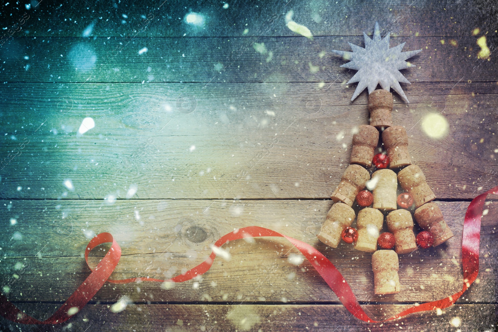 Image of Christmas tree made of wine corks and decor on wooden table, flat lay