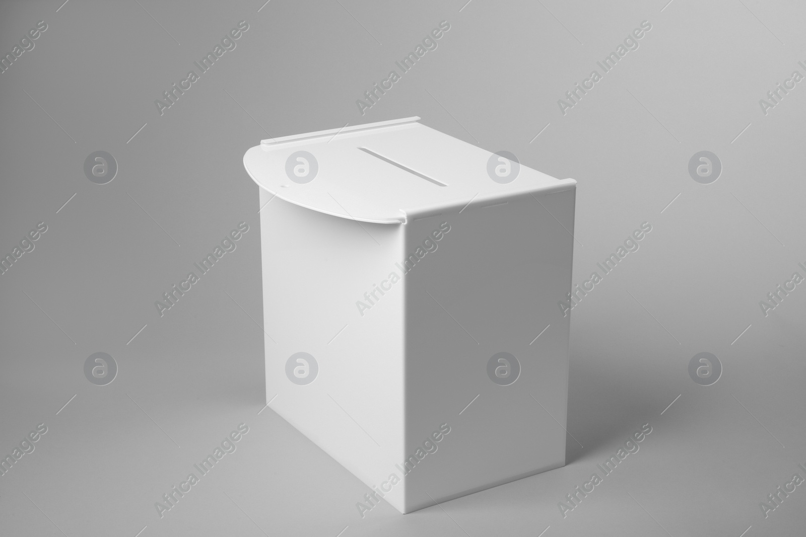 Photo of One ballot box on light grey background. Election time