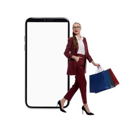 Image of Happy stylish woman with shopping bags and huge smartphone on white background. Advertising mockup with space for design