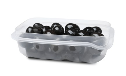 Photo of Fresh black olives in plastic container isolated on white