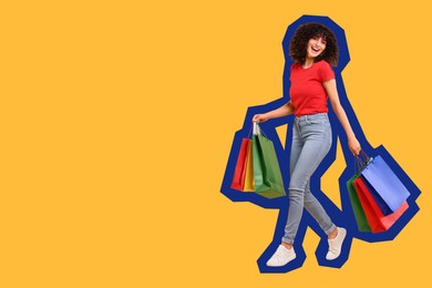 Happy woman with shopping bags on orange background, space for text
