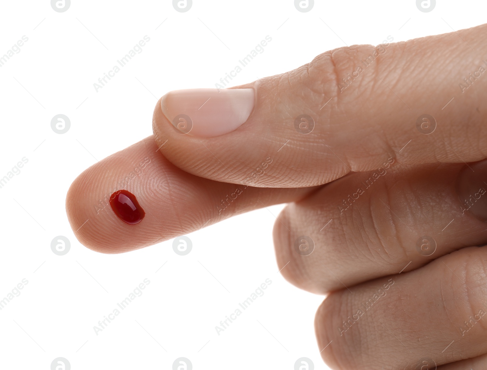 Photo of Woman with pricked finger and blood drop on white background, closeup