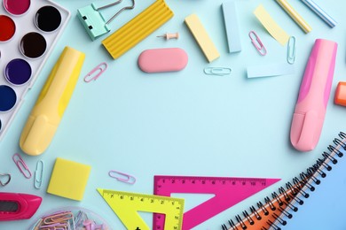 Photo of Different school stationery on light background, flat lay with space for text. Back to school