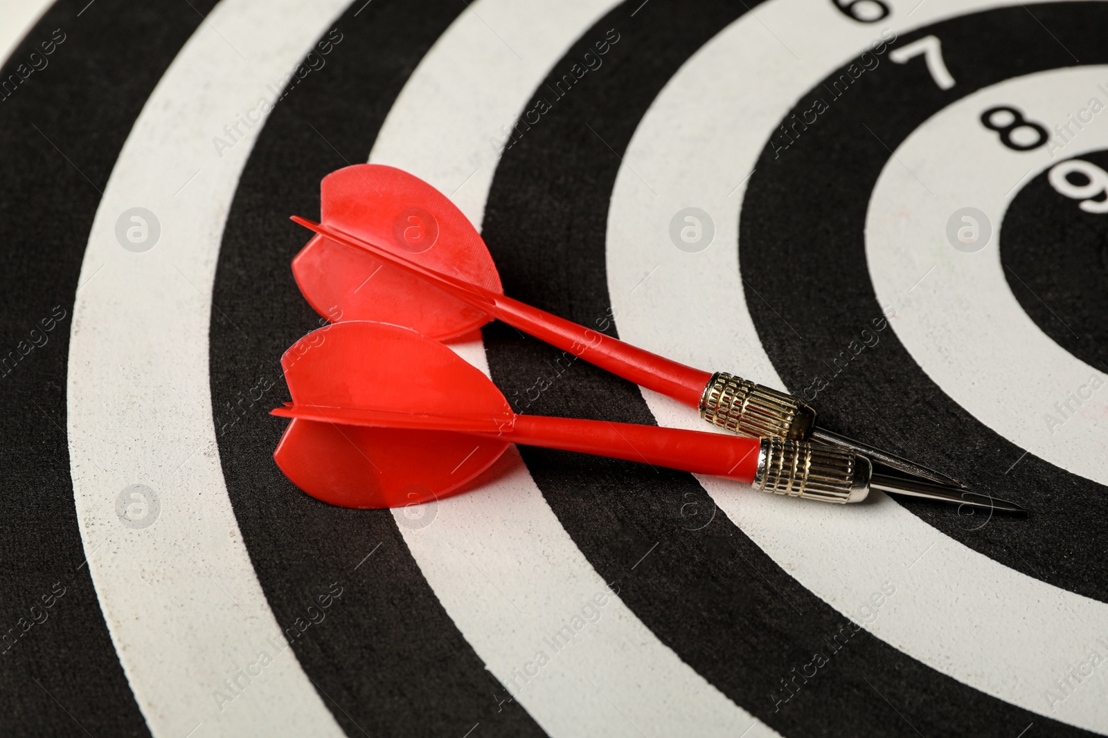 Photo of Red arrows on dart board, closeup view