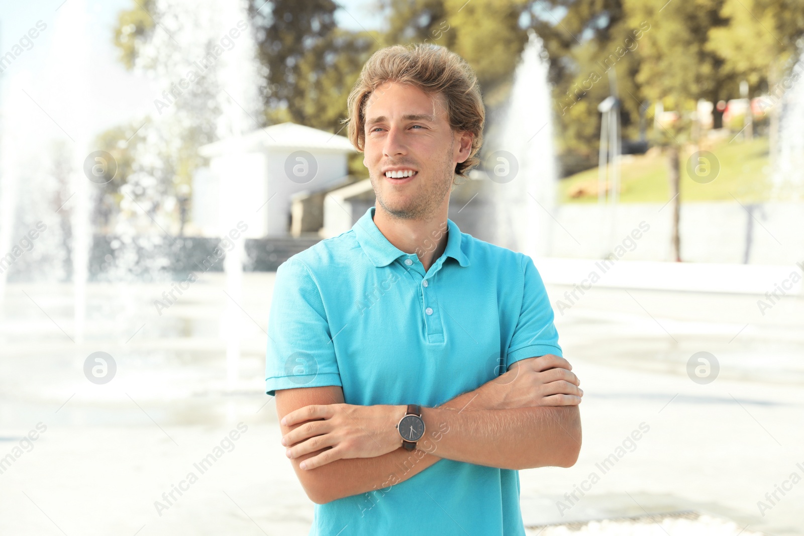 Photo of Portrait of handsome young man on street