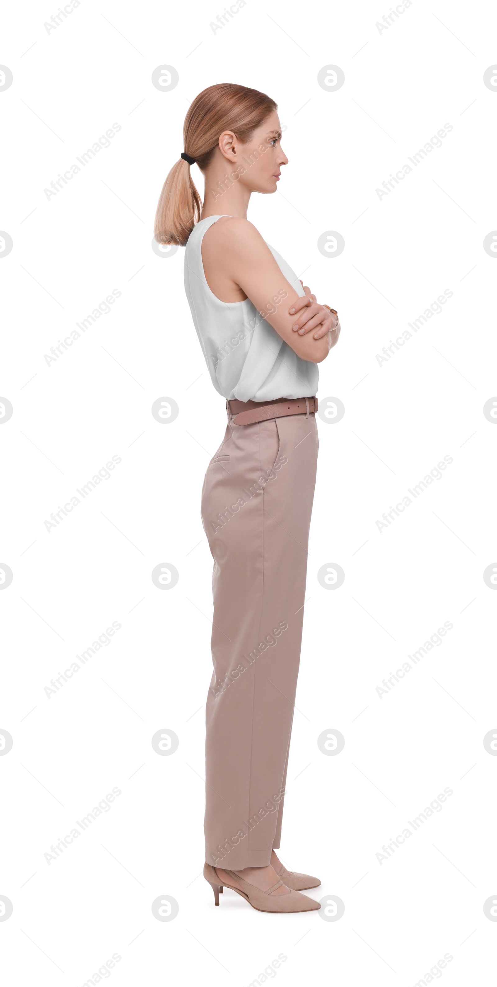 Photo of Beautiful businesswoman crossing arms on white background