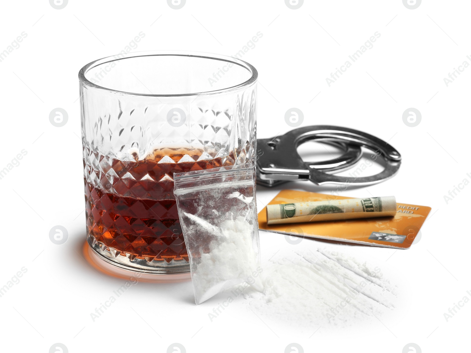 Photo of Composition with cocaine and glass of alcohol on white background