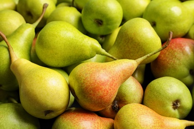 Photo of Fresh ripe pears as background, closeup