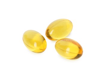 Photo of Vitamin capsules isolated on white. Health supplement