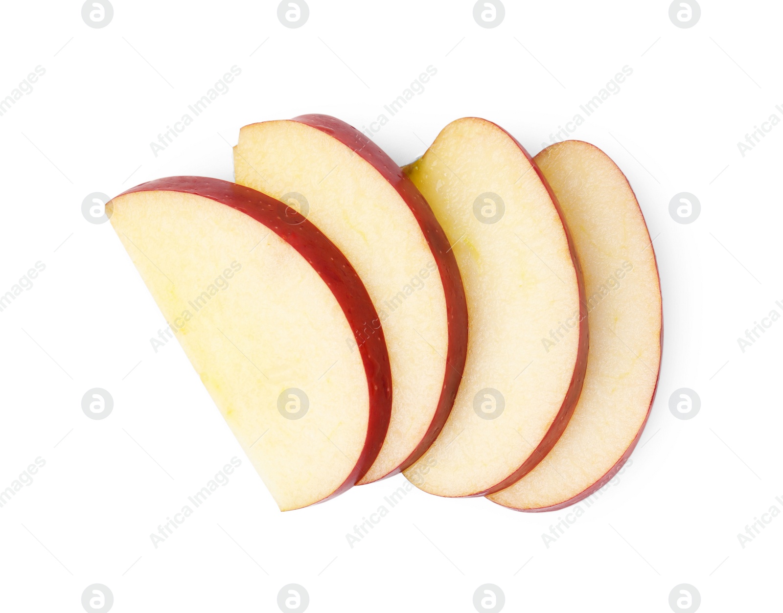 Photo of Slices of ripe red apple isolated on white, top view