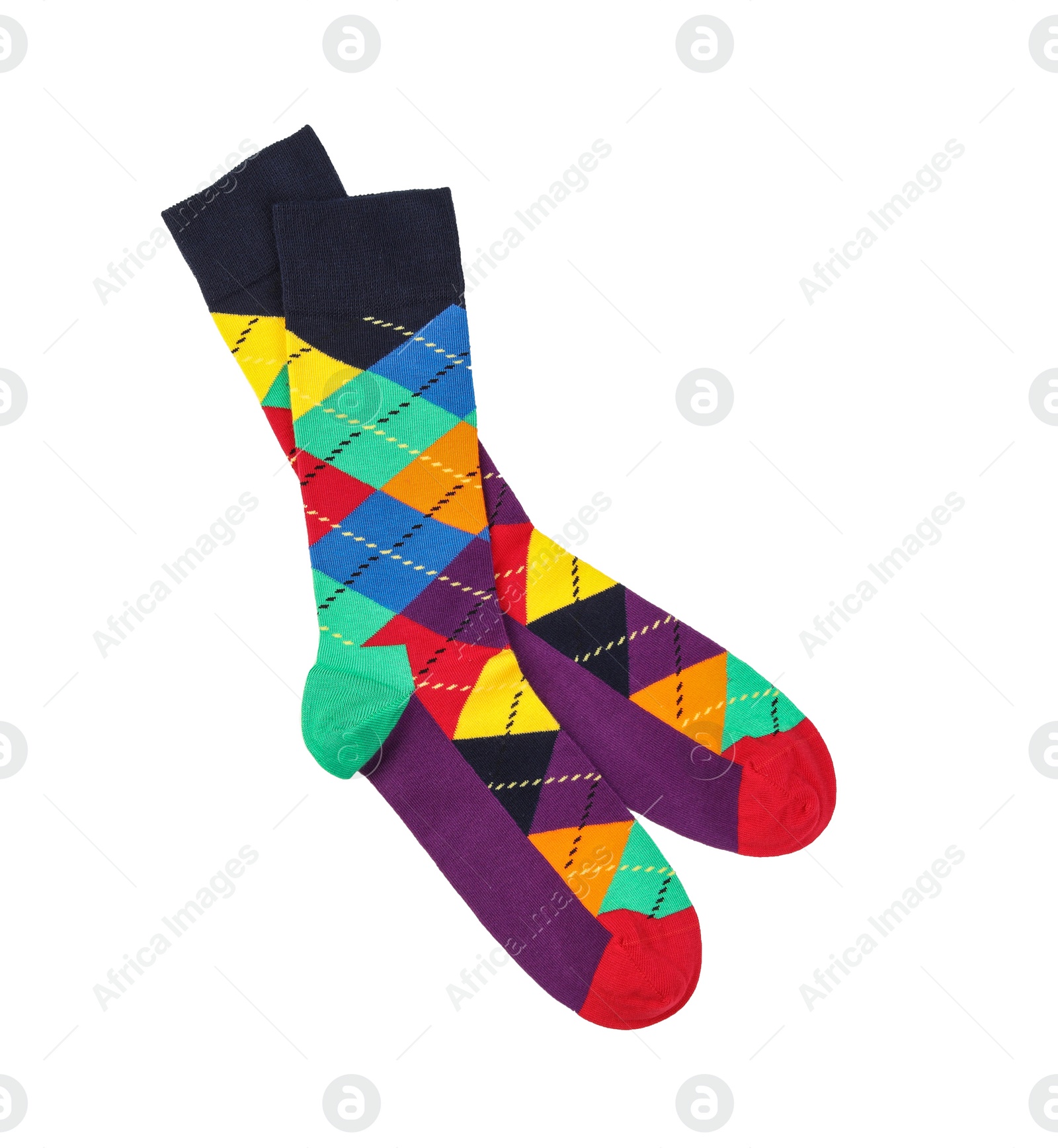 Photo of Colorful socks on white background, top view