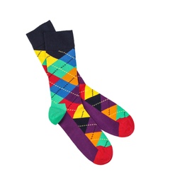 Colorful socks on white background, top view