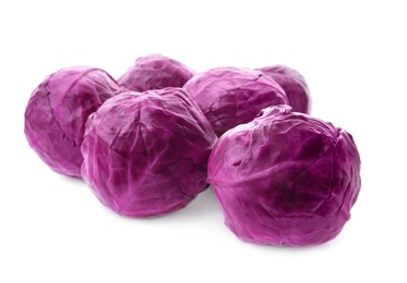 Whole ripe red cabbages on white background