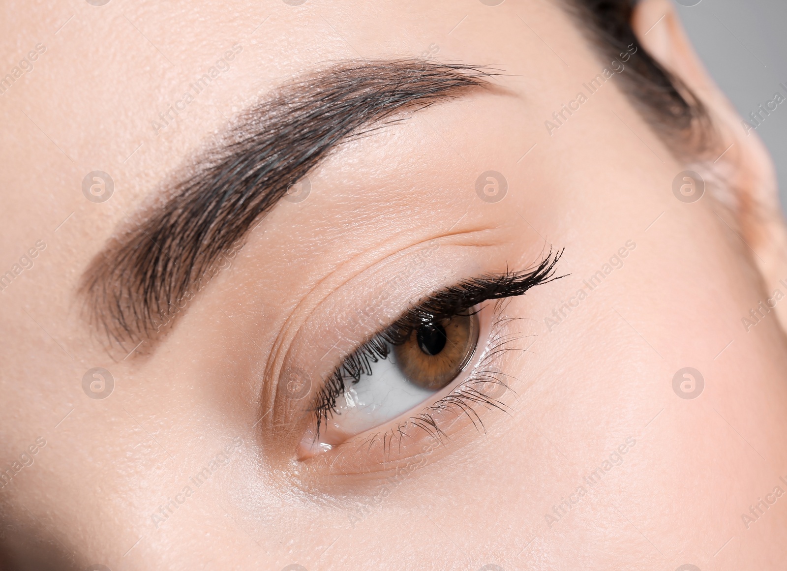 Photo of Beautiful woman with perfect eyebrow, closeup