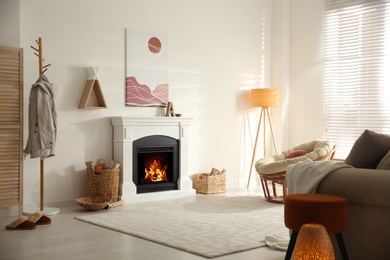 Bright living room interior with fireplace and papasan chair