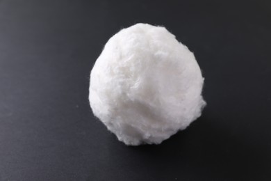 Ball of clean cotton wool on grey background, closeup