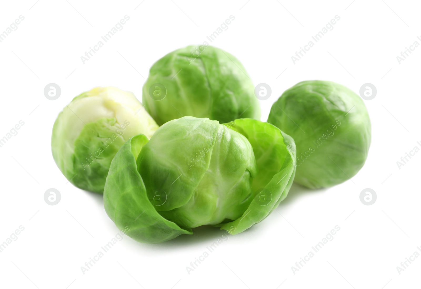 Photo of Tasty fresh Brussels sprouts isolated on white